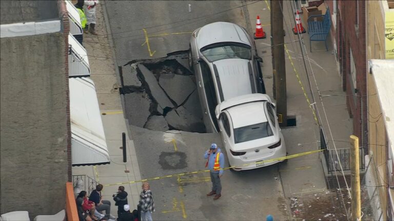 Car falls into sinkhole, another teeters on edge in Philadelphia