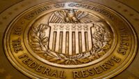 Explainer: What's a recession and why is rising anxiety about it roiling markets?
