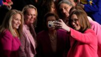 Why are Democratic members of Congress wearing pink at Trump's address?