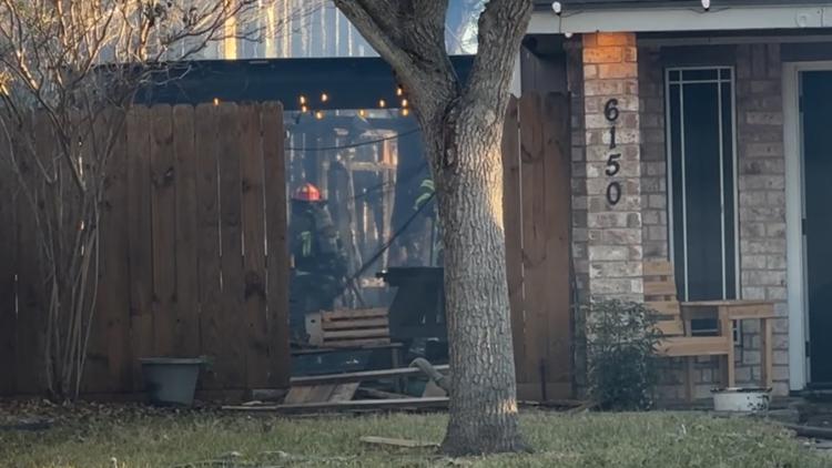 Fire in neighborhood near Bowlero spreads to portion of neighboring property