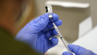 New Trump vaccine policy limits access to COVID shots. Here's what to know