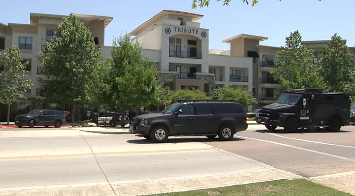 Man detained after trying to attack security, maintenance staff at apartment complex near The Rim, police say