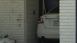 Driver crashes into front door of home on Northeast Side