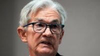Federal Reserve leaves key rate unchanged as it sees risk of higher prices and higher unemployment